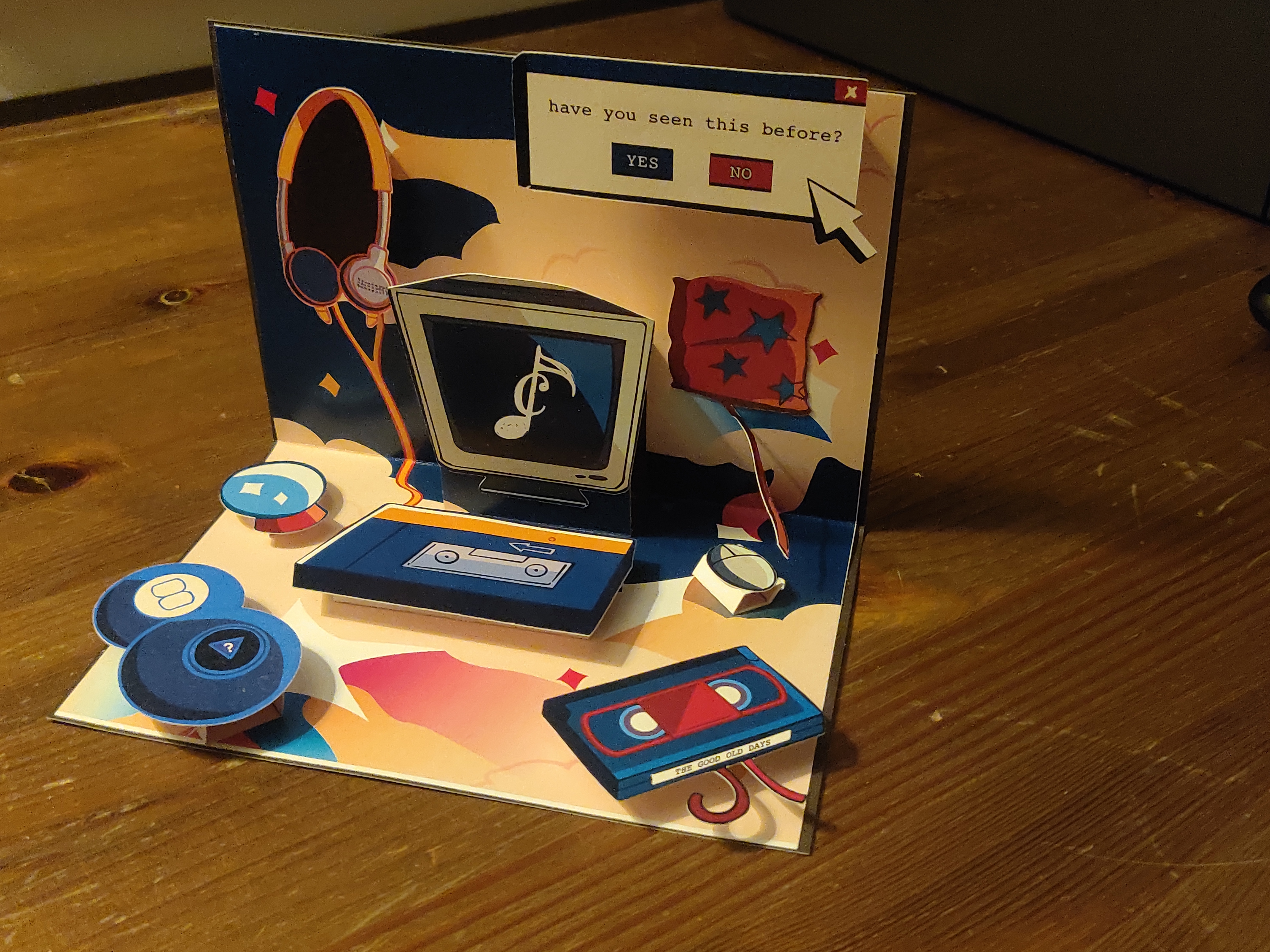 A popup card containing items reminiscent of the 1980s and 1990s